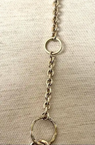 Long silver tone necklace with circles