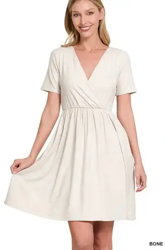Zenana Outfitters faux wrap dress sand cream fit & flare pockets casual surplice small