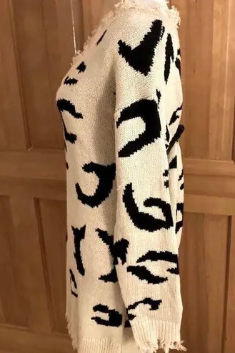 Lavishly Paris NWT, Designer Distressed Sweater Dress. Size Medium