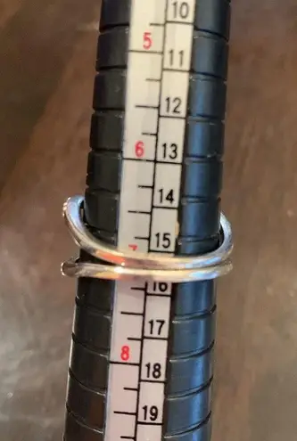 Elegant infinity ring with two overlapping bands 7 Silver