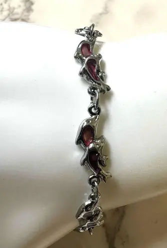 Silver tone dolphin pink abalone bracelet