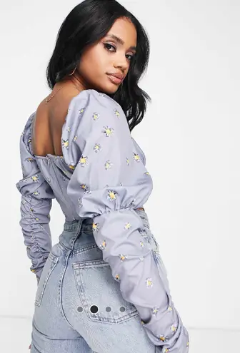 Missguided Misguided milkmaid corset blouse with ruched sleeve in lilac floral