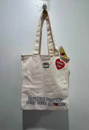 Lounge Fly Hasbro Pound Puppies 40th Anniversary Canvas Tote Bag