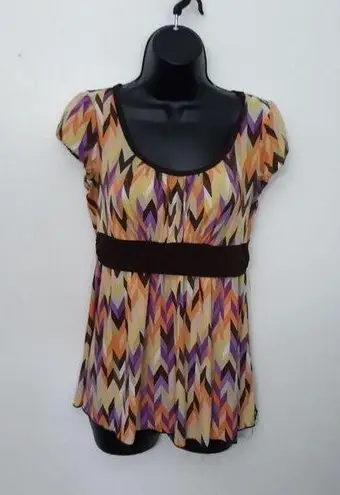 B. Wear multicolored blouse