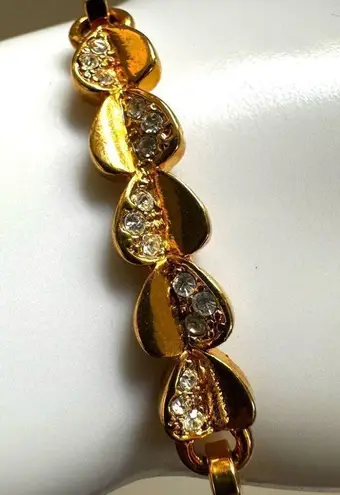 Gold tone heart rhinestone bangle bracelet
