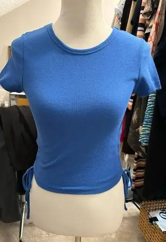 Chicka-d , NWT Blue ribbed crop top with ruching and ties on sides. Small