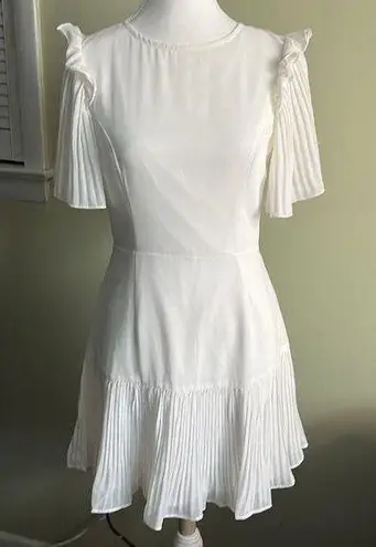 Here Comes the Sun  white ruffle sleeves open back mini dress