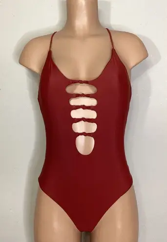 Becca New. knotted one piece. Size medium. Retails $129