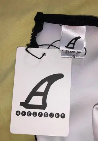 Akela NWT Ákela neoprene long sleeve swimsuit