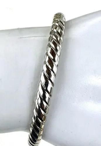 Silver tone twisted bangle bracelet
