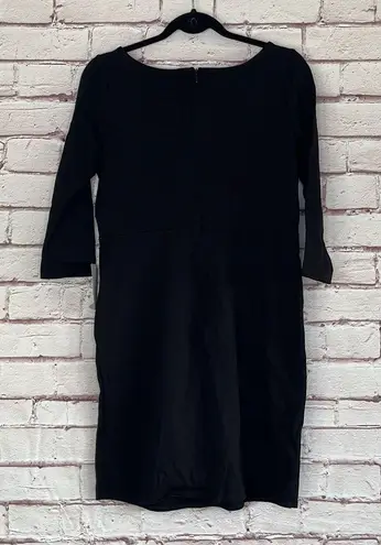 The Vanity Room Long Sleeve Little Black Dress NWT. Stretchy material with pockets. Zipper in back.  34.5” long 16” bust approximately 11” sleeve inseam