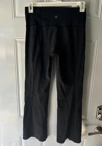 Lululemon  black bootcut leggings. No size but fits like a 10. Some wear