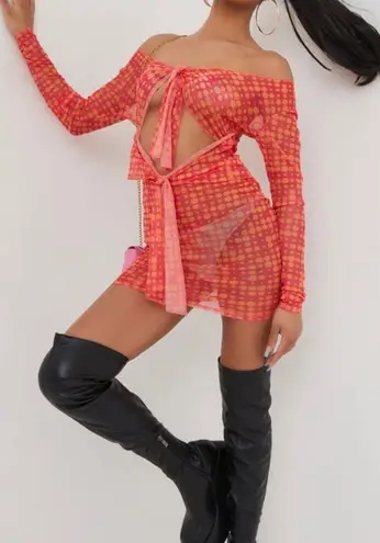 EGO LONG SLEEVE KNOTTED CUT OUT DETAIL MINI BODYCON DRESS IN PINK SPOTTY MESH