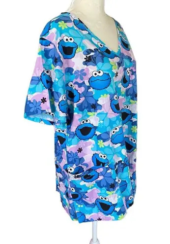 Sesame Street women's L blue and lavender short sleeve cookie monster scrub top