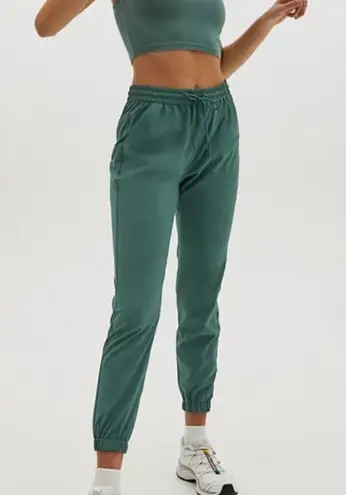 Aritzia TNA Speed Jogger Athletic Drawstring Tapered Leg Pull on Teal Blue Sz M Size M