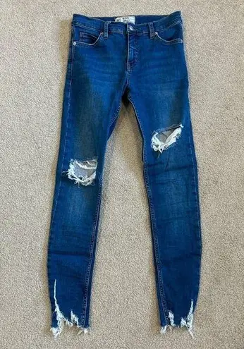 Free People  distressed high rise blue skinny jeans in size 27