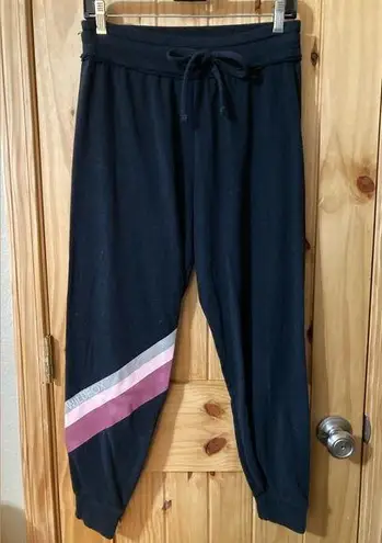 Wild Fox size S black joggers with pink/gray stipe detail on right leg