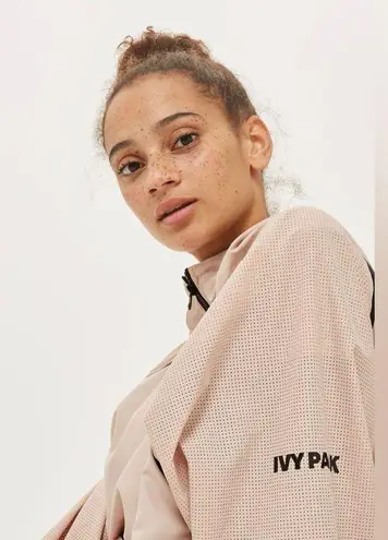 Ivy Park Women’s Perforated Mesh Hooded Pullover Jacket in Dusty Pink Size S