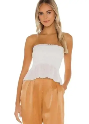 Indah  Greta Strapless Smocked Peplum Top in Peach, Size M