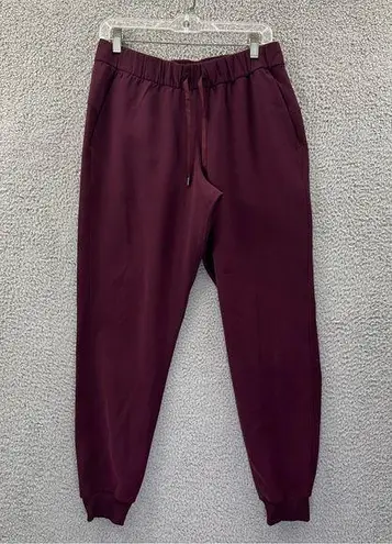 Lululemon  On the Fly Jogger Woven Cassis Maroon Red Women's 8 x 28