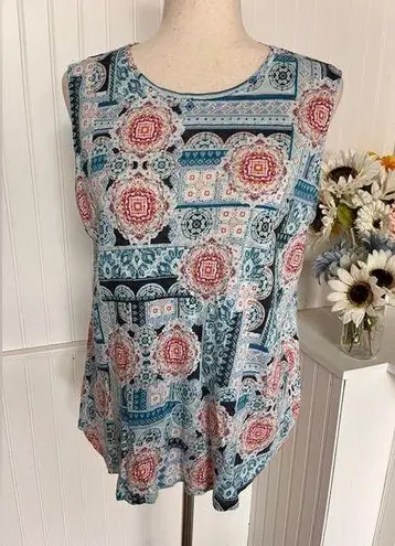 Stunning colors of blue, pink, and orange print adorn this tank. Pink Size M