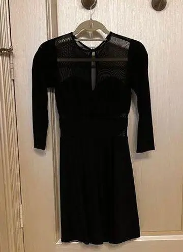 Bebe  sheer panel black dress