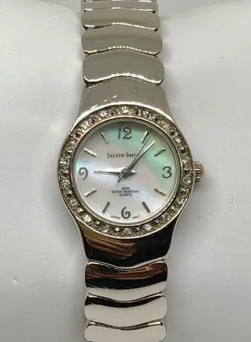 Jaclyn Smith women’s Quartz analog watch 22mm pearl dial cuff bracelet 7” runs