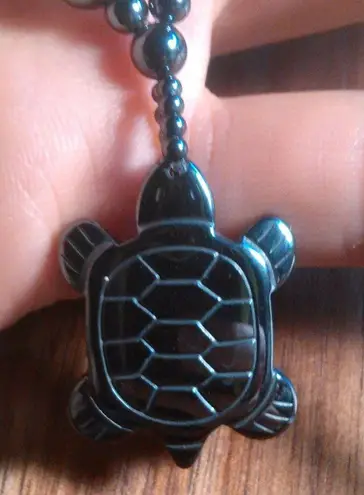 Turtle Charm And Beaded Hematite Necklace