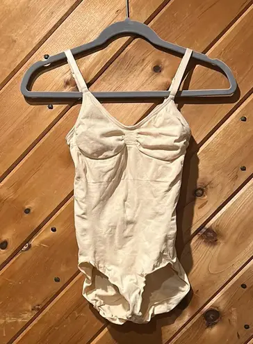 SKIMS seamless sculpt brief bodysuit shapewear in sand tan color