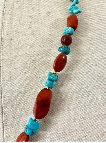 Brass elephant pendant necklace with carnelian, turquoise and red jasper beads