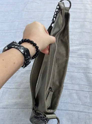 Olivia and Joy pewter hand bag with zipper embellishments.