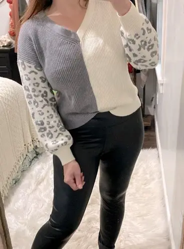 ee:some  grey leopard print sweater size small/medium