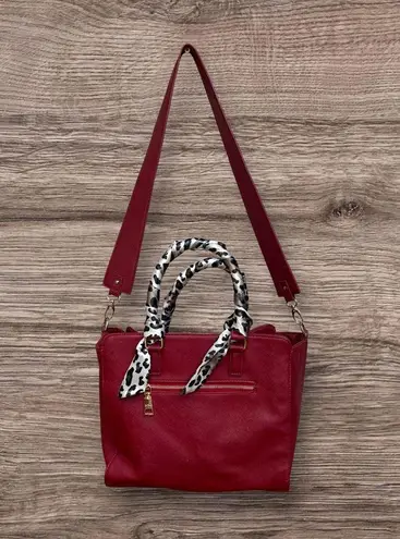 BCBG Paris Satchel Handbag with scarf wrapped strap handles. Red