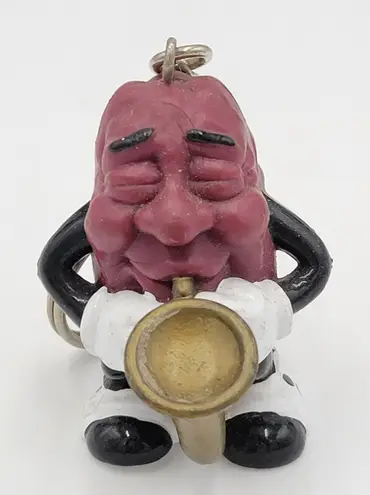 Raisin's California 1987 Vintage Raisin Saxophone Player Keychain