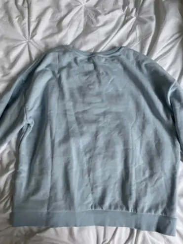 Francesca's  blue sweatshirt