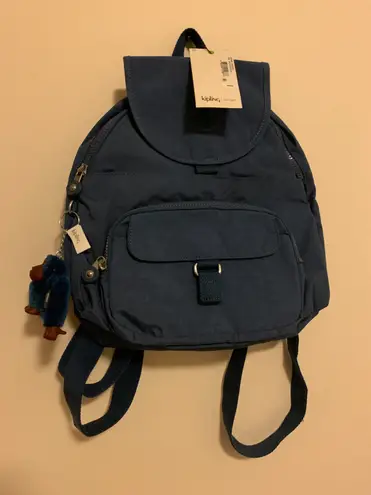 Kipling NWT backpack delicate blue Adjustable Backpack Straps Monkey Keychain 38 61 Off Retail New With Tags From A