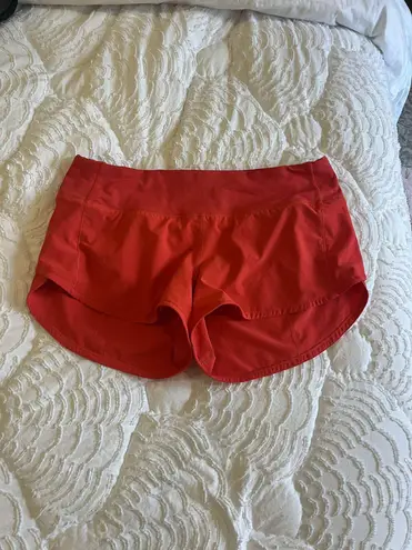 Lululemon Speed Up Mid-Rise Lined Short 4" in Red in size 6