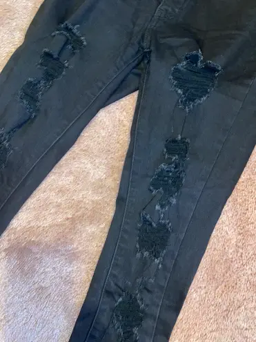 Levi’s 711 Black Ripped Skinny Jeans Size 25