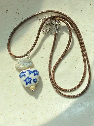 Handmade celestial porcelain heart bead & Czech leaf unique boho fairy whimsical necklace🌙🌀🌟