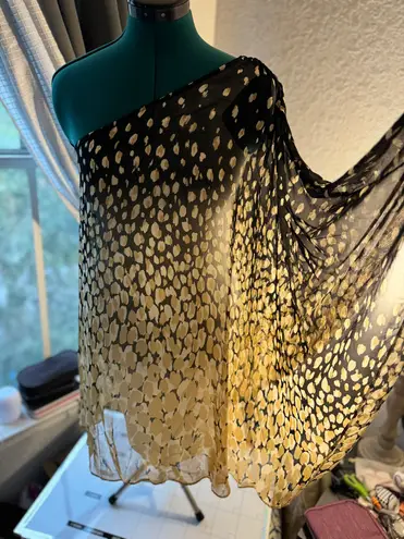 Julie Brown One-shoulder dress with a golden and black abstract print. Lightweight, flowy,