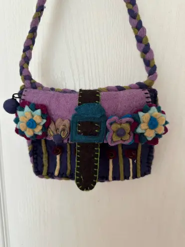 Chrissy Teigan Rising Tide Woman’s Blue 100% Wool Shoulder Purse with Flower and Pompom Details