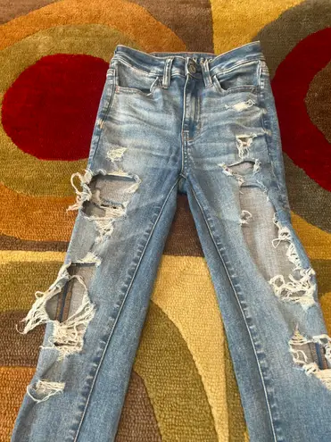 American Eagle NWOT  Next Level Stretch Super Hi Rise Jegging Distressed Size 000