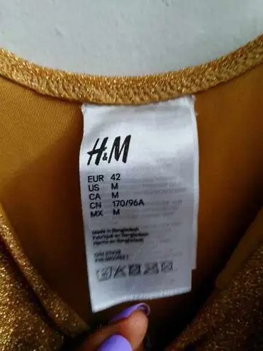 H&M holiday sparkly glitter bodysuit Christmas new years in gold size medium.