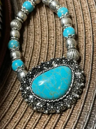 Western women’s faux turquoise and silver stretch bracelets. Blue
