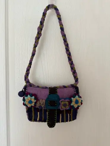 Chrissy Teigan Rising Tide Woman’s Blue 100% Wool Shoulder Purse with Flower and Pompom Details