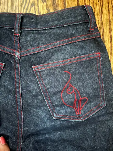 Baby Phat Vintage Dark Wash Jeans with red stitching and cat accent