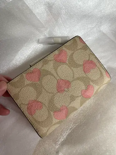 Coach Medium Corner Zip Wallet In Signature Canvas With Heart Print CQ146