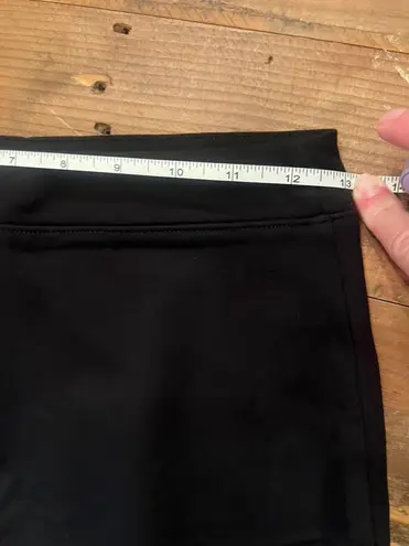 Urban Outfitters  - black mini skort with front slit. Size small.