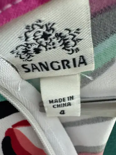 Sangria Sleeveless dress with vibrant floral!