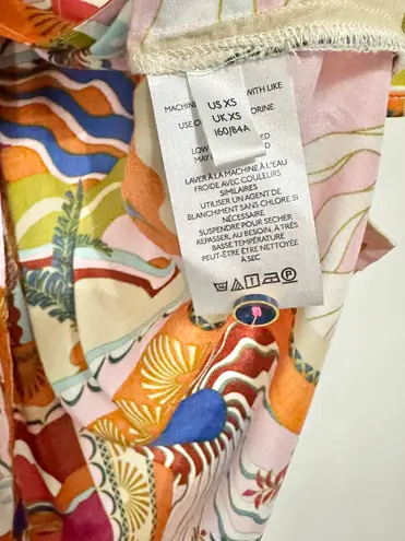 Maeve Anthropologie bon voyage loose maximalist short sleeve button down